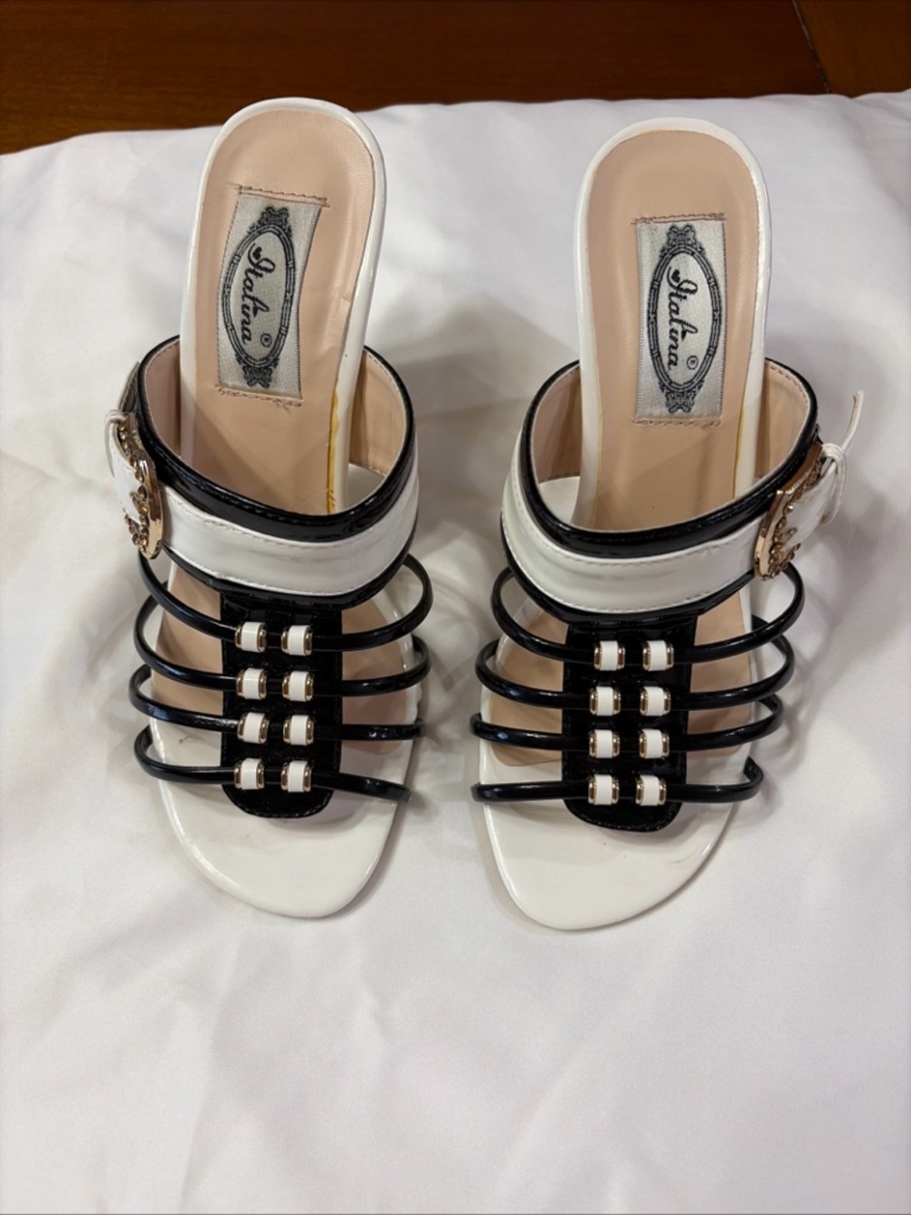 Italina Black and White Strappy Slide Mules with Buckle Accent